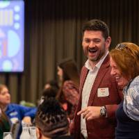 senior leadership laughing